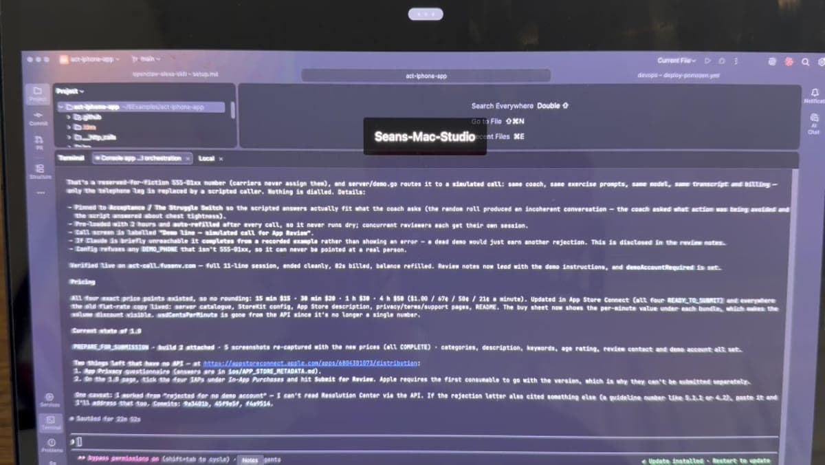 A remote Mac Studio desktop with an IDE open on an iPhone app project, the terminal filled with a long agent report about App Store submission state, pricing changes and remaining tasks